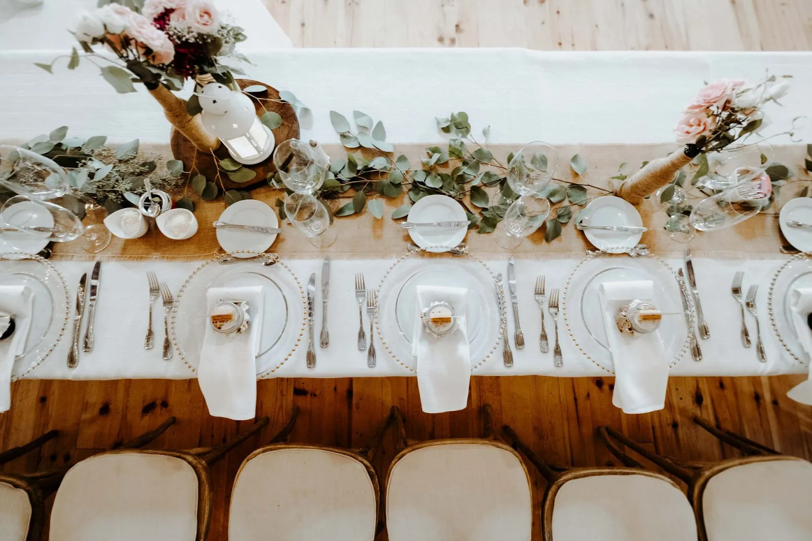 Custom wedding catering table setting at a farm venue
