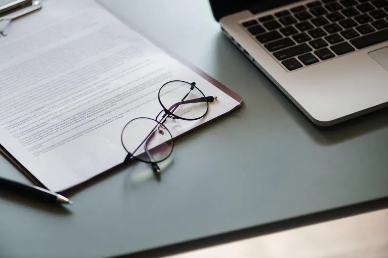 Couple completing marriage paperwork and legal documents